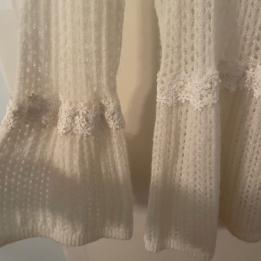 White knitted blouse